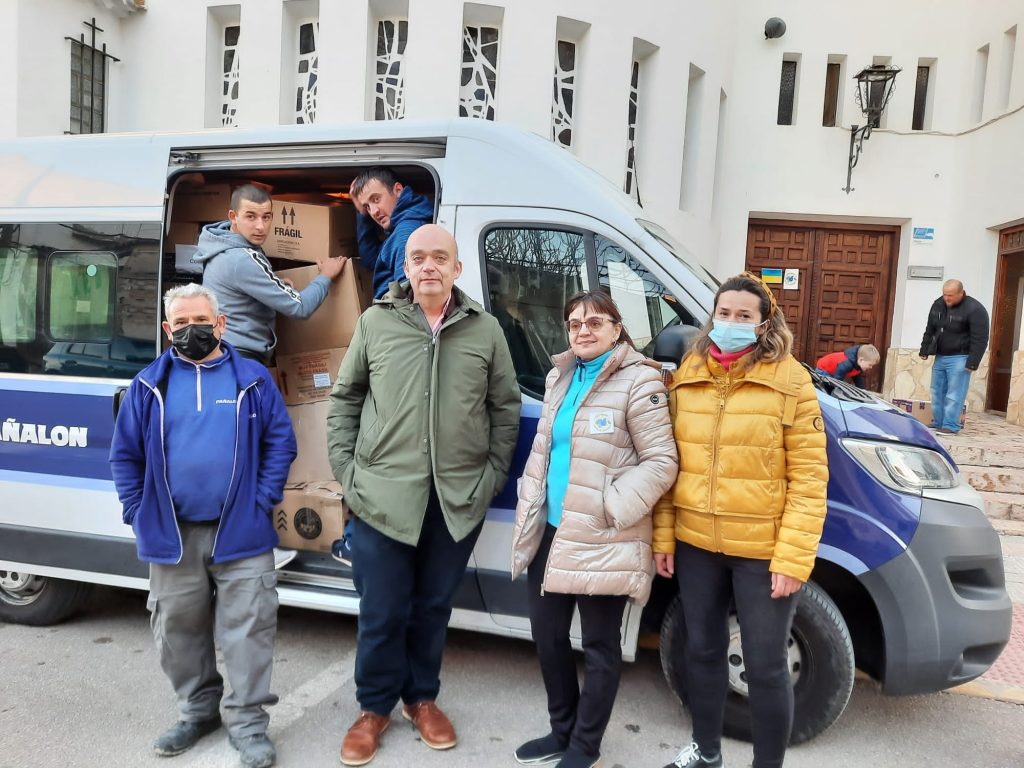 Team in front of van